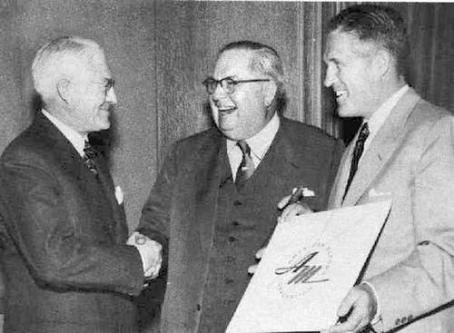 Hudson's A. E. Barit celebrates the birth of American Motors with Nash's George Mason and George Romney Image source: inforum.com