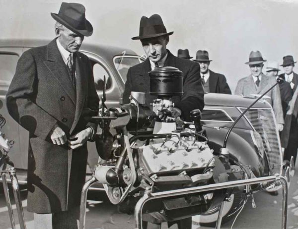 Henry and Edsel Ford cheerfully introduce the V8-60 to the US range for 1937.