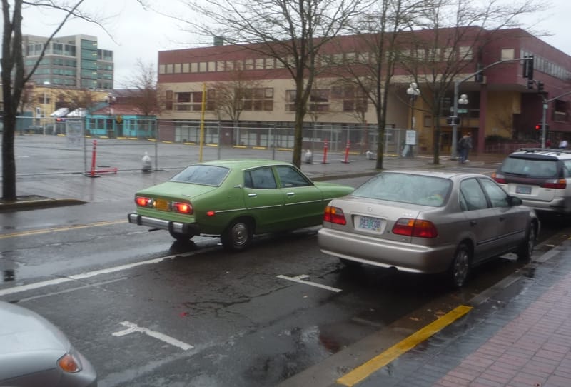I’ve been collecting a nice little stash of Datsun  B210 shots for a future CC: two hatchbacks, a couple of two-door sedans. There’s about half a dozen still plying the [&hellip;]