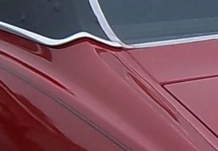 It took a little while, but Lummox correctly guessed the Mercury. Nice job! A little red, a little black, and a pinstripe. What is it?
