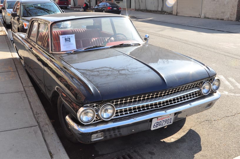 pictures by Triborough I was walking down the Cohort sidewalk, when I came across this black ’61 Ford sedan. Galaxie Club Coupe; looks pretty decent, for what was undoubtedly an [&hellip;]