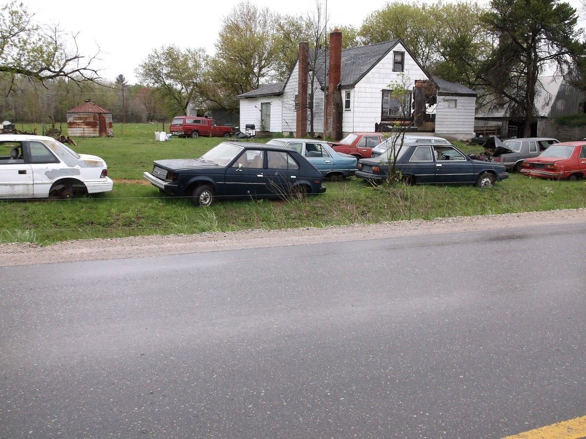 My lovely bride grew up in rural northern Michigan, and we visit her mom and stepdad fairly regularly.  We always pass a “hoarder house” with one of the strangest car [&hellip;]