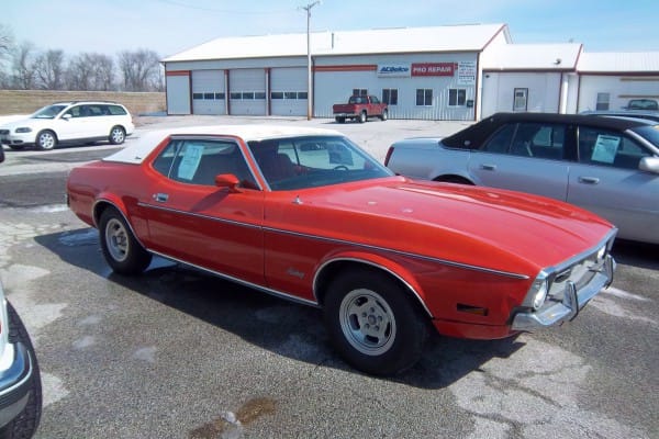 Two years ago, on Halloween, I wrote up this very orange 1973 Ford Mustang Grandé. While a bit weathered, it was still in pretty good shape, albeit with some very [&hellip;]