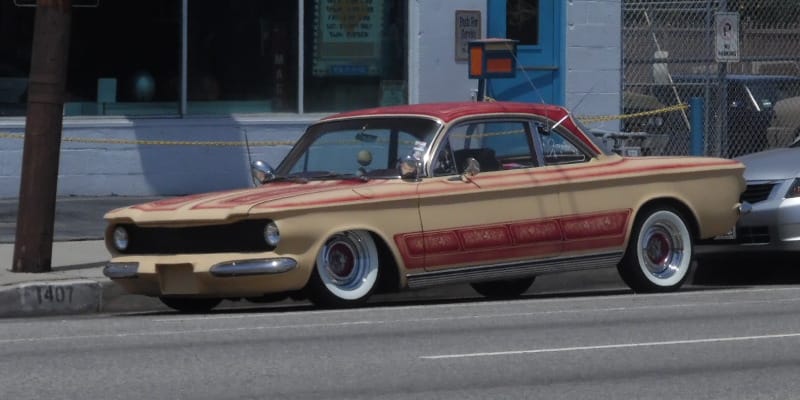 Given the love lavished on the Corvair here at Curbside Classic, I had no choice but to stop and collect a few pictures of this ’61-’64 Coupe parked in front [&hellip;]