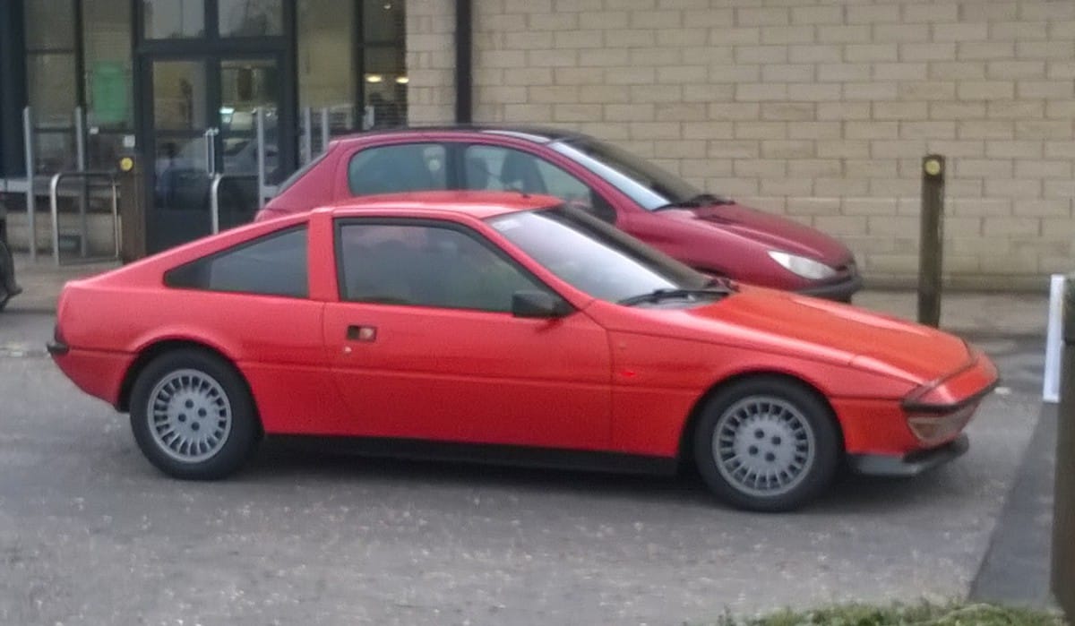 Have you ever wondered if Europe had a car to match the Pontiac Fiero? Mid-engined, but derived from the ordinary? Composite bodywork? Dramatic styling? Pop up headlamps? I give you the [&hellip;]