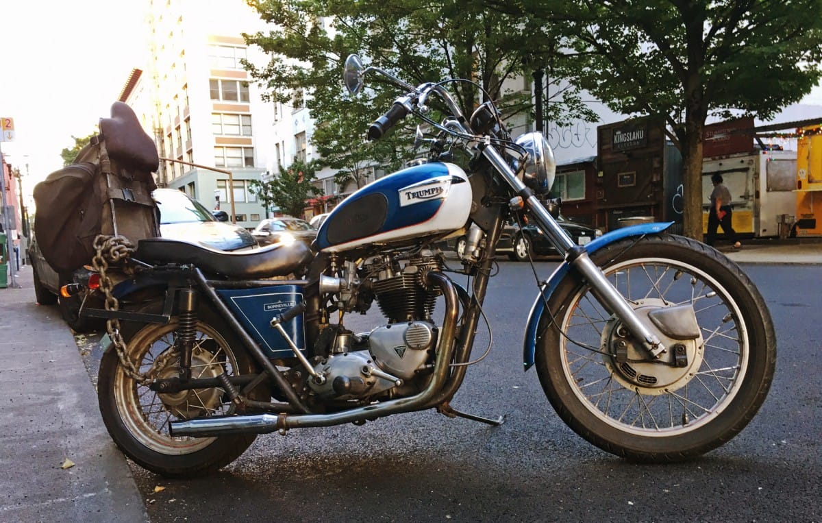 The sun was beginning to set when I saw this classic Triumph Bonneville. Back in my day custom motorcycles were made, not purchased like consumer goods. This bike looks like [&hellip;]