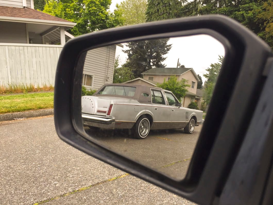 Yesterday’s ’52 Chrysler in the sideview mirror got enough positive response to make me dredge through my archives to find more. Today’s