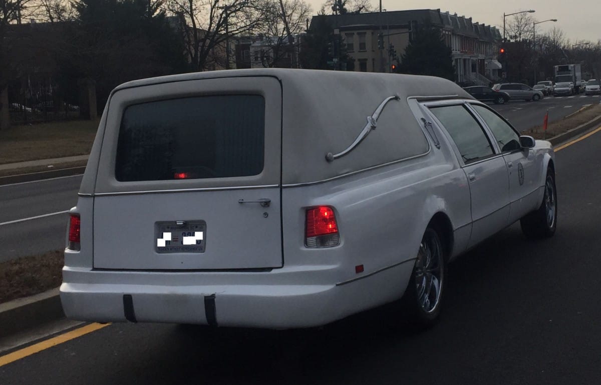 E Newman posted a couple of shots of what looks to be a RR hearse gaining on his car. Really?