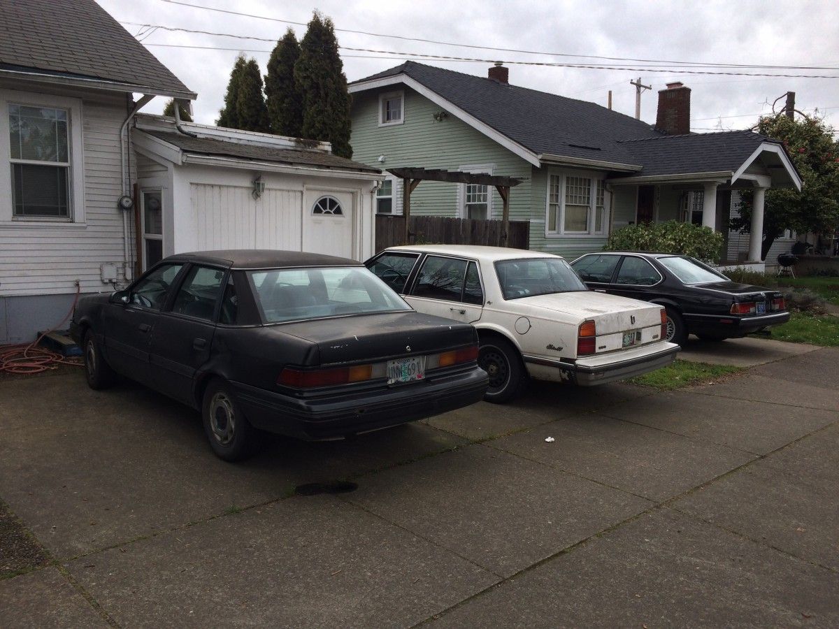 CC Driveway Outtake: Three Old Cars, One Very Nice One These neighbors share a mutual interest in vintage cars. But their tastes diverge some, and not just between domestic and import.