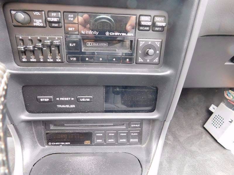 977950560