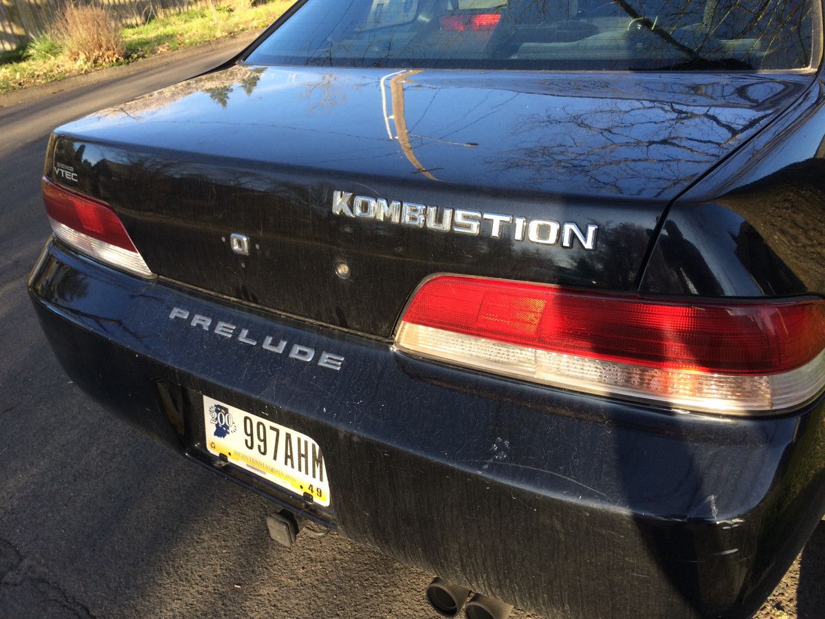 I’ve seen some unique and altered badging on cars, but this one is a bit different. A celebration of the Infernal Kombustion engine?