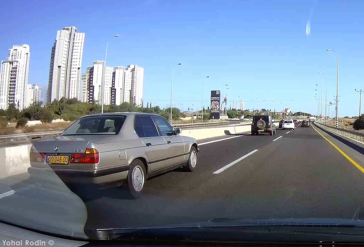 Dash-Cam Outtake: BMW E32 735i Last week whilst driving to visit my extended family, I happen to come across a rare 1980s luxury, blasting down the motorway.