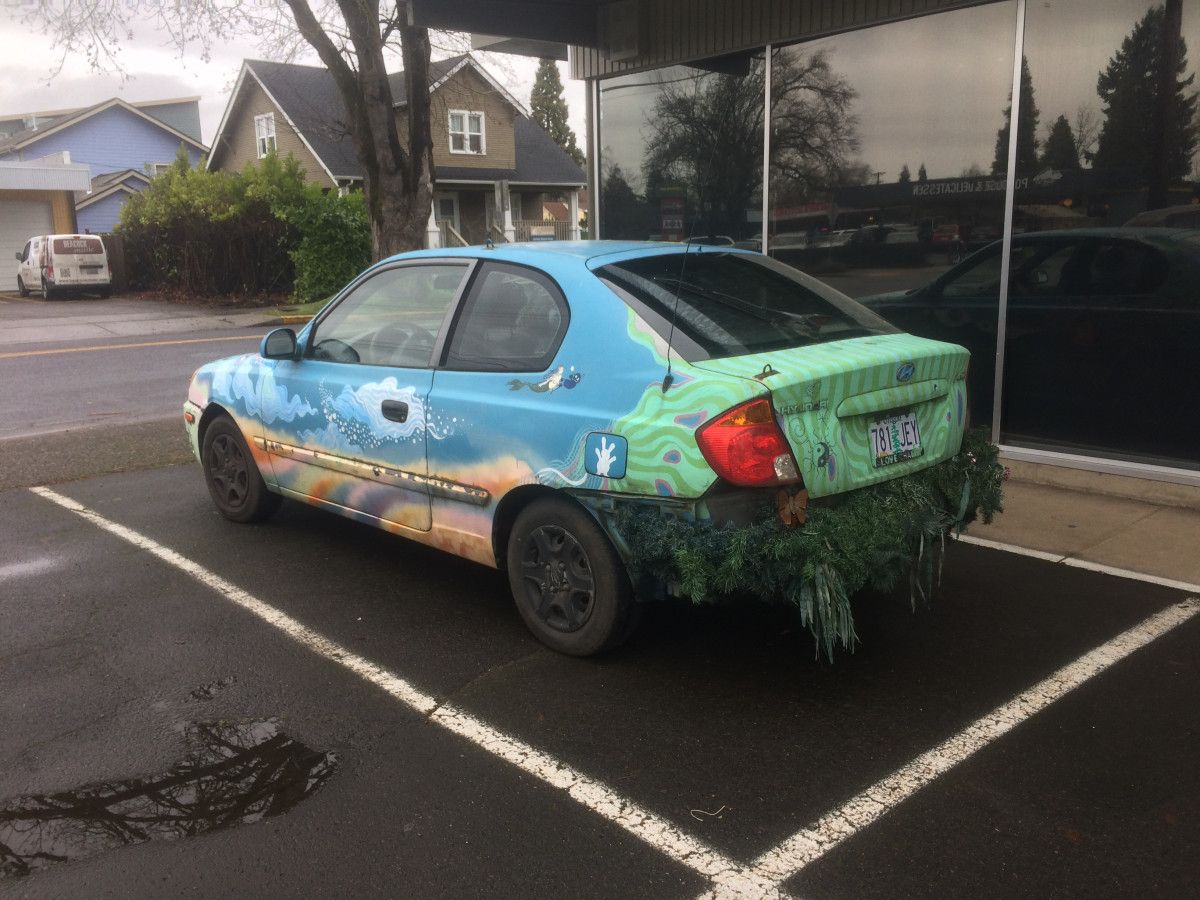 My quest to document all the painted cars of Eugene continues. And here’s a fine specimen: a 2004 Hyundai Accent not only pained but adorned with seasonal greenery instead of [&hellip;]