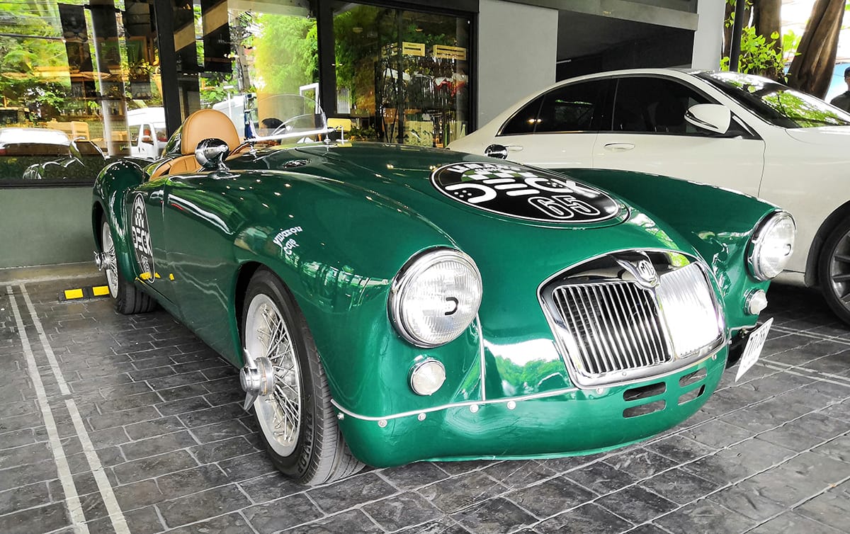 (first posted 2/16/2019)      I have no idea how in the world this MG A came to a corner of my street in Bangkok. It looked like it materialized [&hellip;]