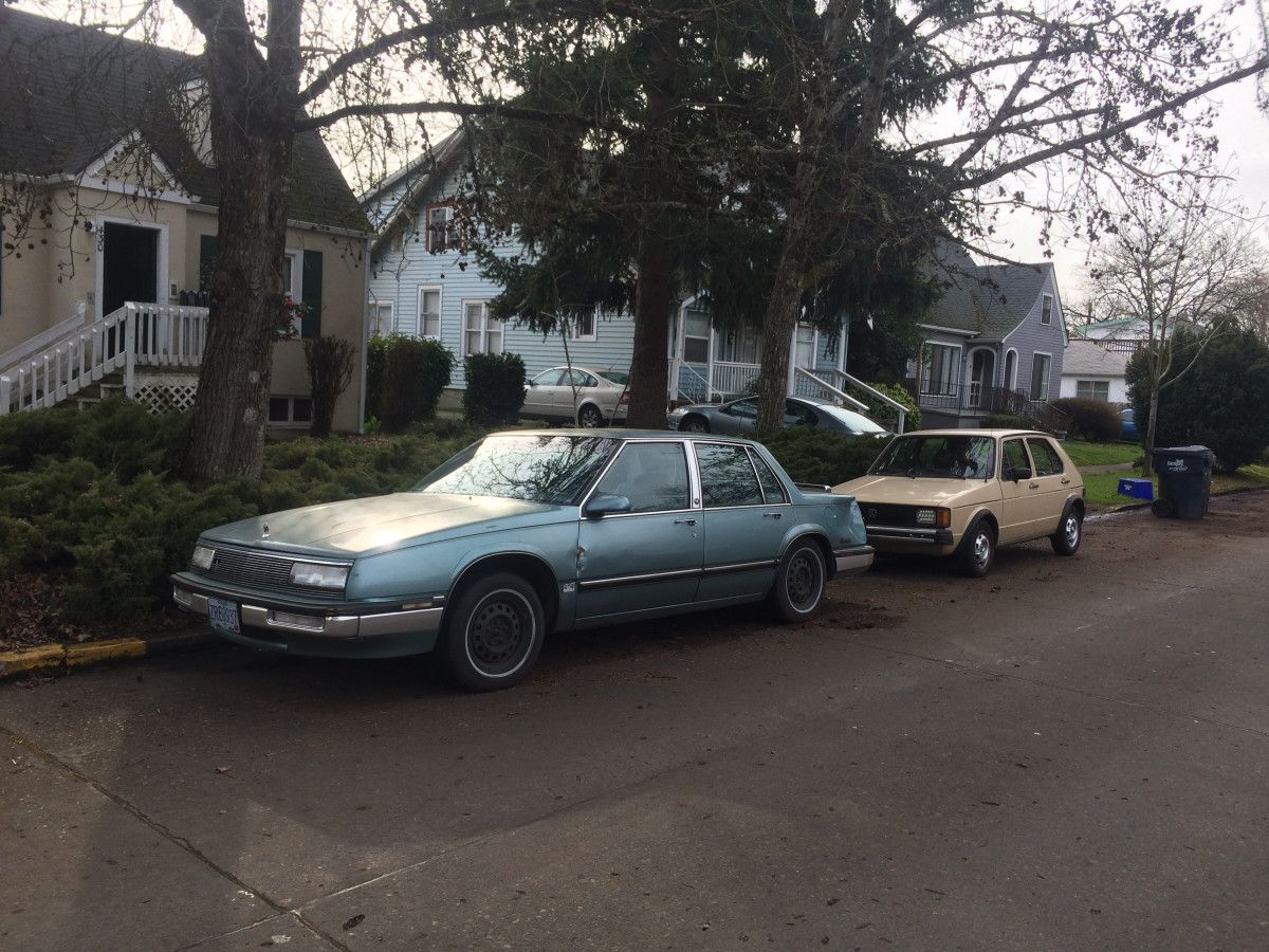 (first posted 3/31/2019)         Naturally I had to stop and shoot this twosome, as they’re both getting on in years. And they represent the first generation FWD cars [&hellip;]