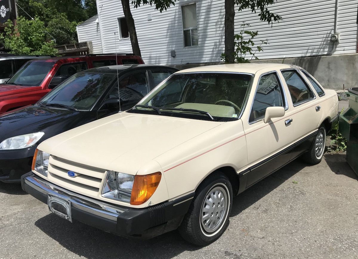 William Oliver has found a near-unicorn: a first or second year Ford Tempo, with the original non-aero sealed beam headlights. Near-unicorn, you say? Well, the reality is that all-new American [&hellip;]