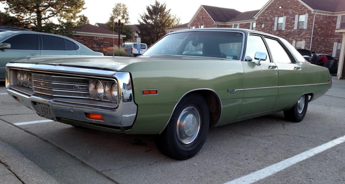 1971 Chrysler Newport Royal: Chrysler's Deadly Sin #6, The Underachieving Fuselage Years 1 1971 Chrysler Newport Royal 4-door sedan in a parking lot.