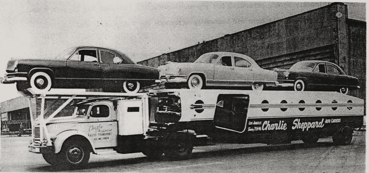 Another Reo, this time hauling 1951 Kaisers.