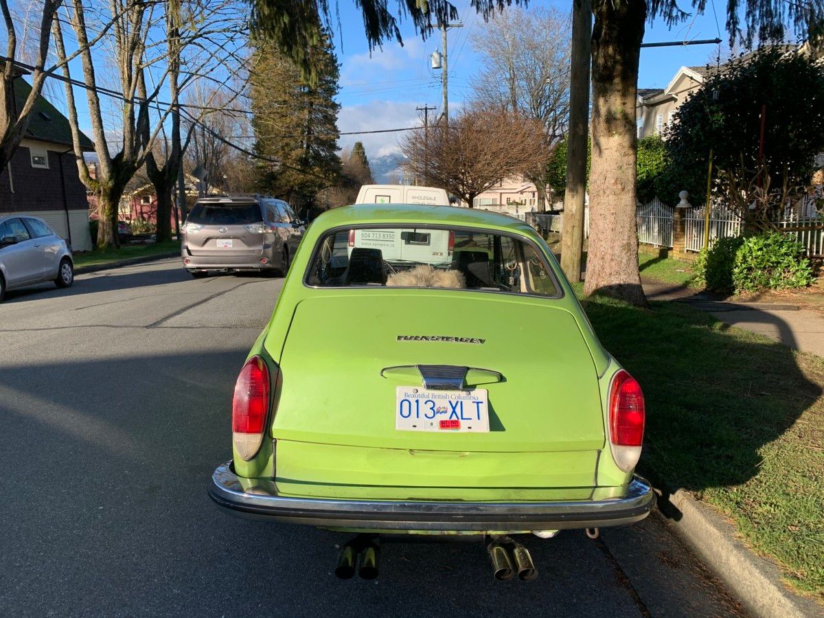 Cohort Pic(k) of the Day: The Faster VW Fastback Robadr caught this VW Type 3 fastback sporting a fine quad exhaust system, as well as its splendid original lime green paint job.