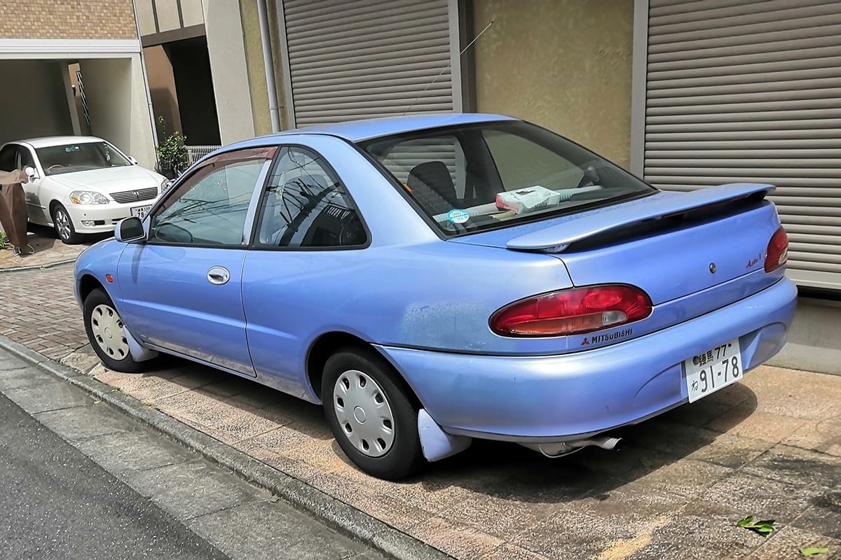 The air was shimmering in the midday heat over the deserted metropolis. Far away, on the horizon, a distinctly ‘90s blue two-door appeared suddenly, as if by magic — or [&hellip;]