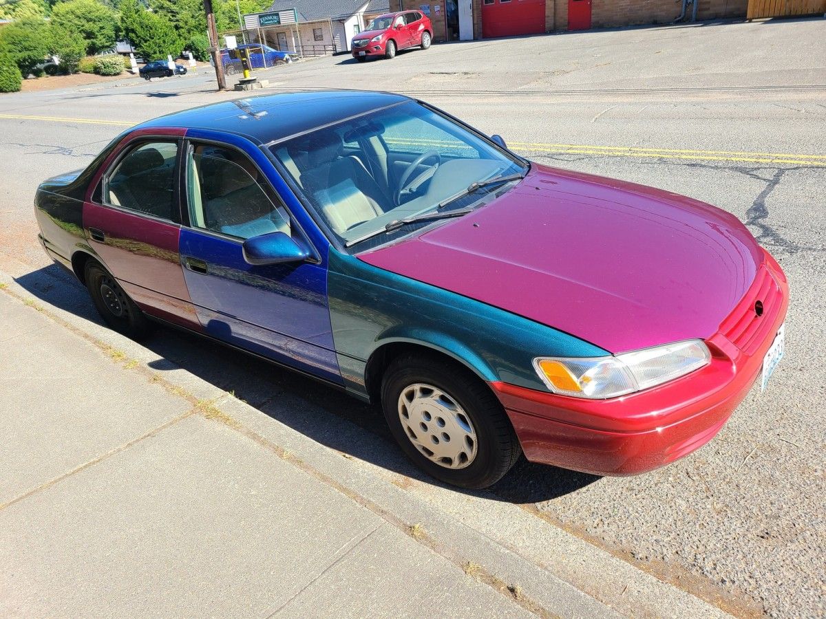 Mike Hayes has posted pictures of this multi-hued Camry. At first glance I though it had been in an accident and had some body parts replaced by junkyard pieces. Someone [&hellip;]