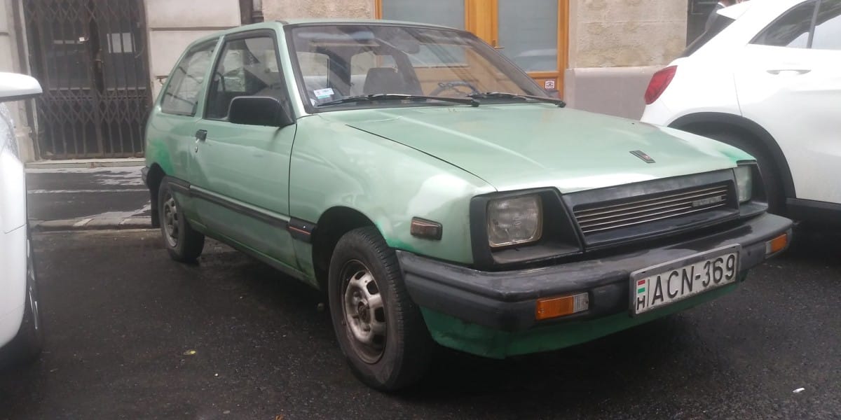 Roshake 77 came across this poor little SuzukiSwift (Chevrolet Sprint in the US) looking a bit lost among the much bigger contemporary cars of today’s Budapest. It’s identified as a [&hellip;]