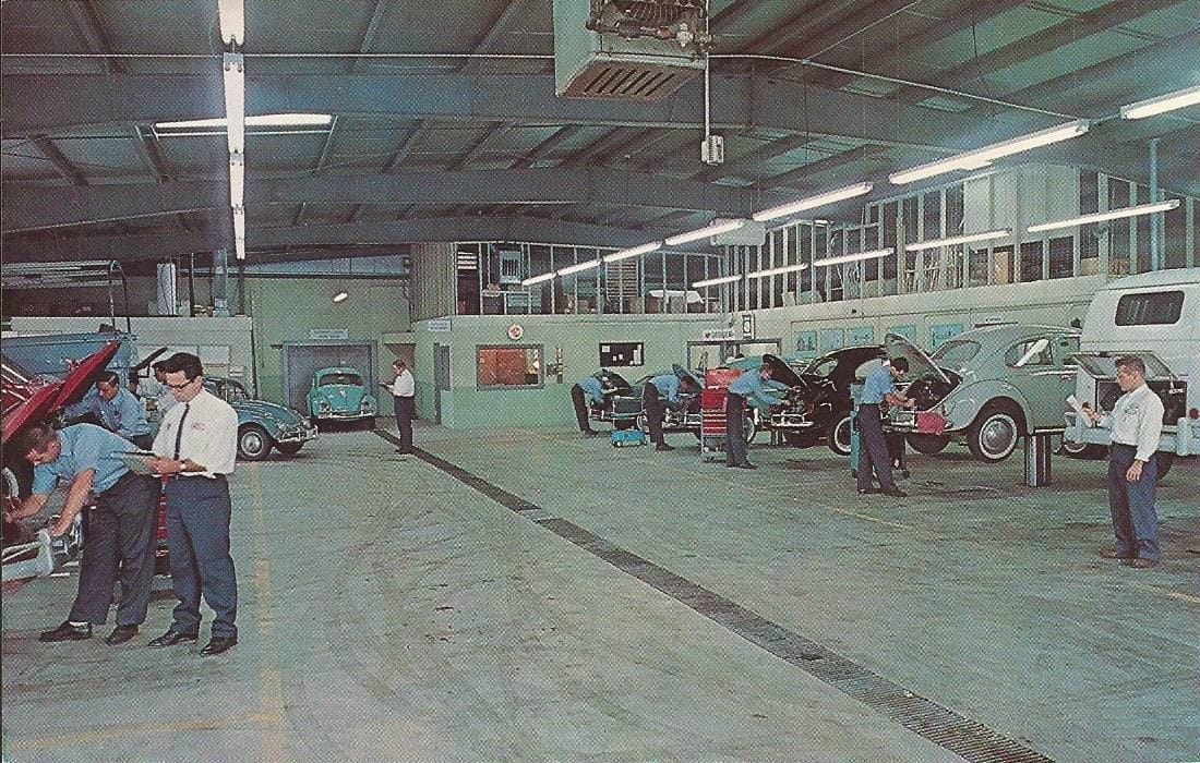 It looks so bare here in the Jimmy Payne VW service department in Memphis, TN; just VWs with guys bending over their engines, and a few tool chests. Here’s another: