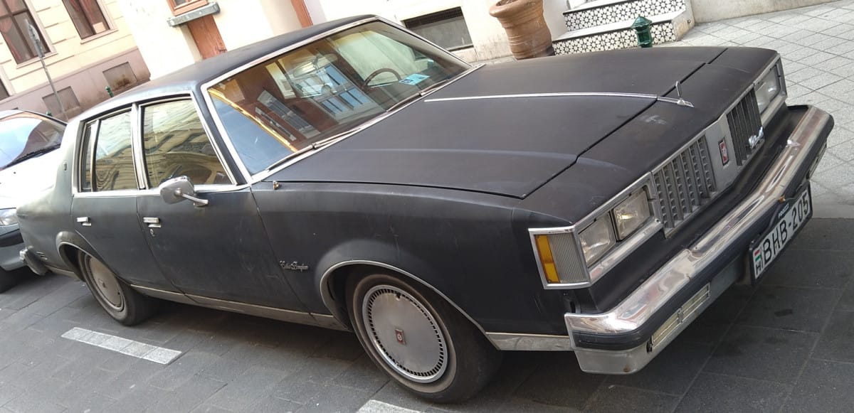 Cohort Pic(k) of the Day: 1982 Oldsmobile Cutlass Supreme Brougham – Traditional Architecture Cohort poster Roshake keeps finding cars in Budapest that used to be prolific on our streets, but no longer. Where did all these budget Sevilles go? To Hungary, apparently.