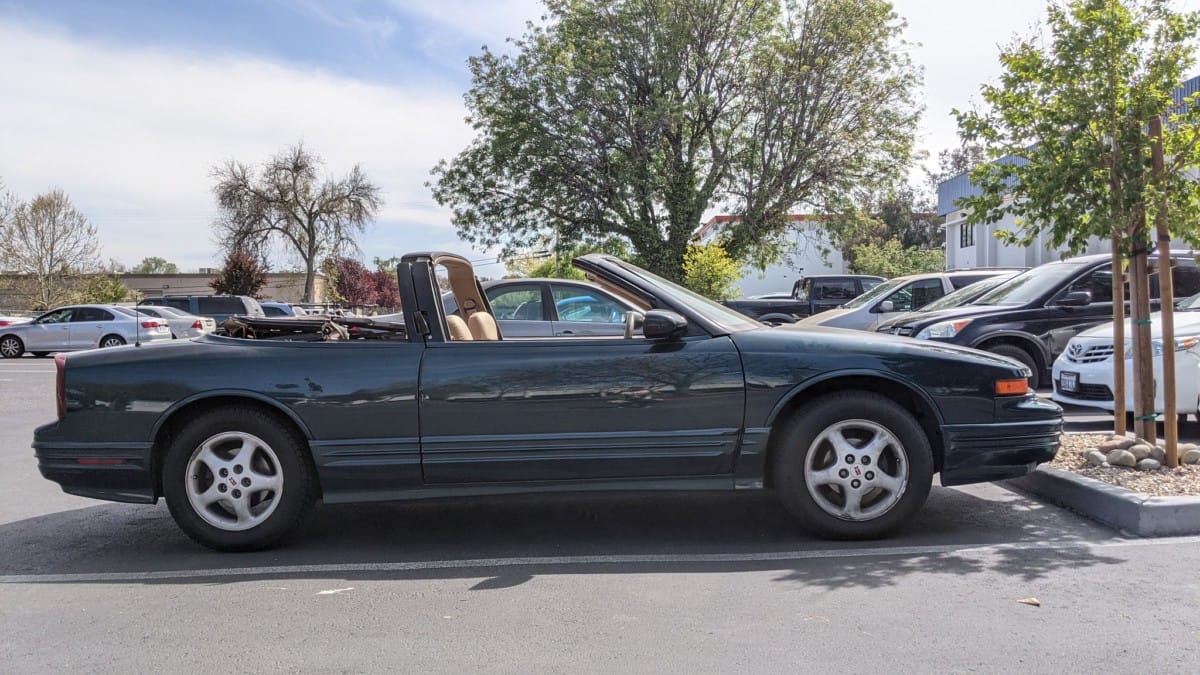 William Garrett shot this rather rare Cutlass Supreme  convertible appropriately enough in Sunnyvale, CA. Why the loop-handle? Because the Cutlass’ door handles were embedded in the B-pillar, and GM wasn’t [&hellip;]