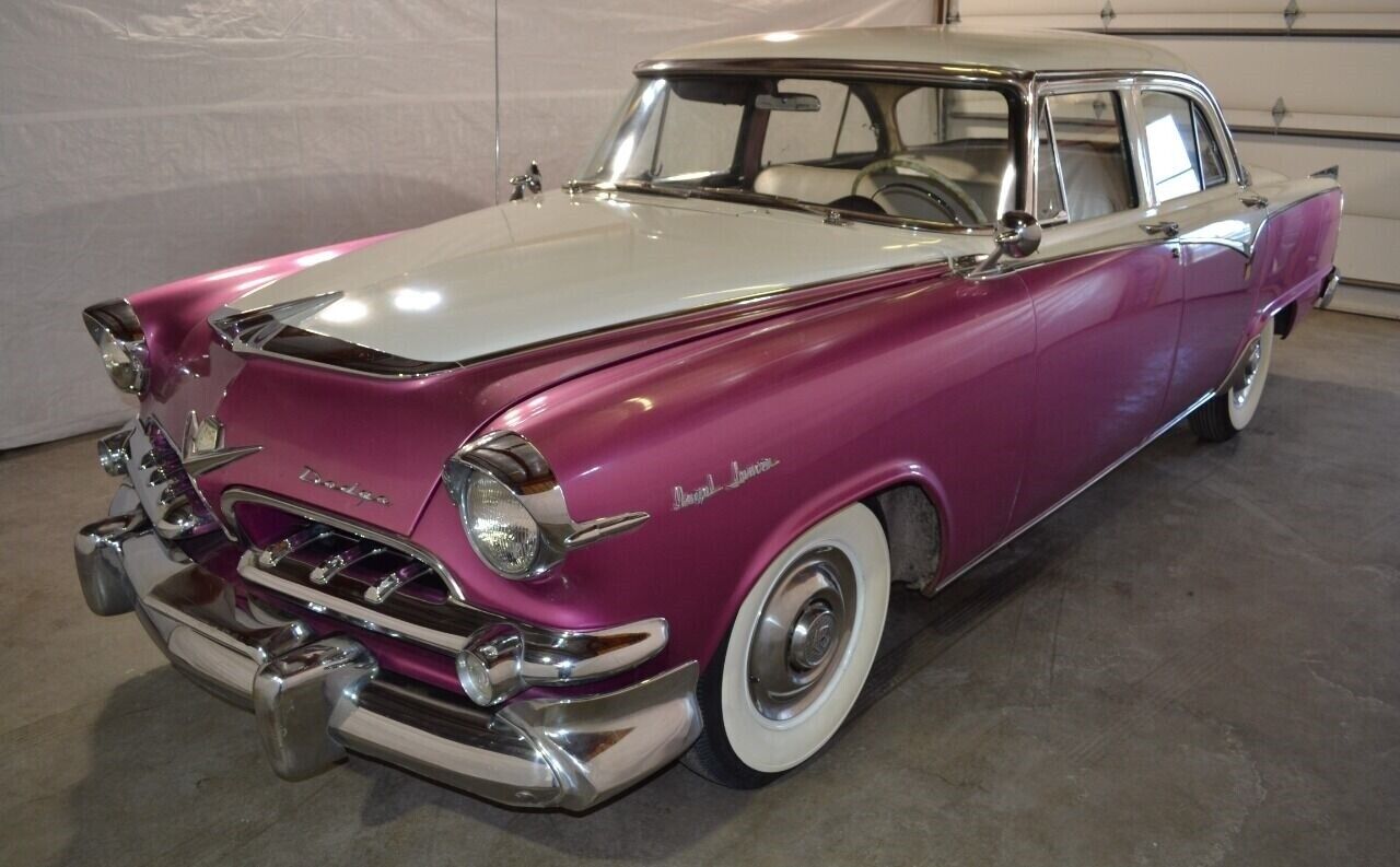 Here’s something you don’t see every day (more likely, never)–a Spring Special 1955 Dodge Royal Lancer sedan in two-toned purple and white.  With power steering!  Super-wide “grandaddy” whitewall tires!  A [&hellip;]