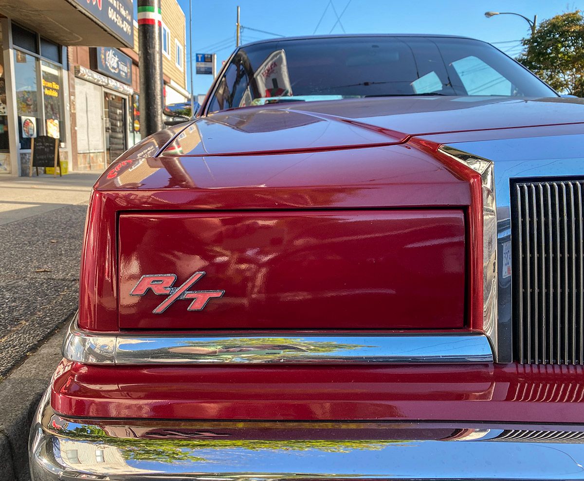 CC Capsule: 1988 Chrysler New Yorker – Whence R/T Thou? Hello, what’s this? There on the right headlight door, what is that? There isn’t-never-was a thing such as a Chrysler New Yorker R/T, and