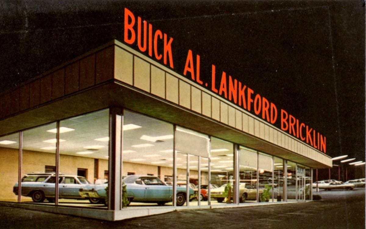 There’s something not right about this picture. Al Lankford really was a Bricklin dealer, but look at the cars in the showroom.