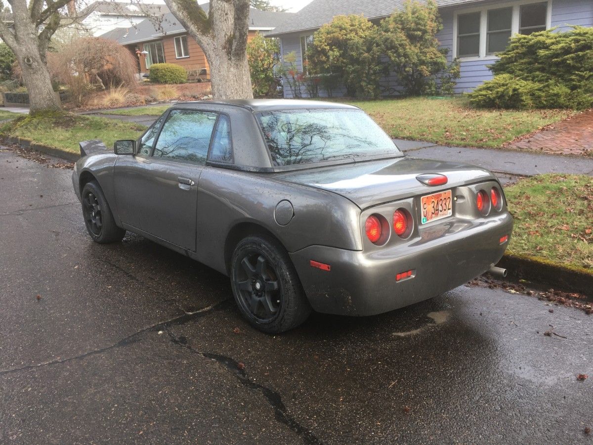 When I first saw the back end of this car from a block or so away, I had a momentary brain fart. What is that? Those two big round taillights [&hellip;]