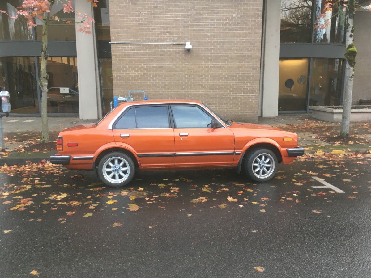 I still have a number of my curbside finds to post, and obviously this one is from early winter. The bright orange Civic really popped out that dark, wet day, [&hellip;]