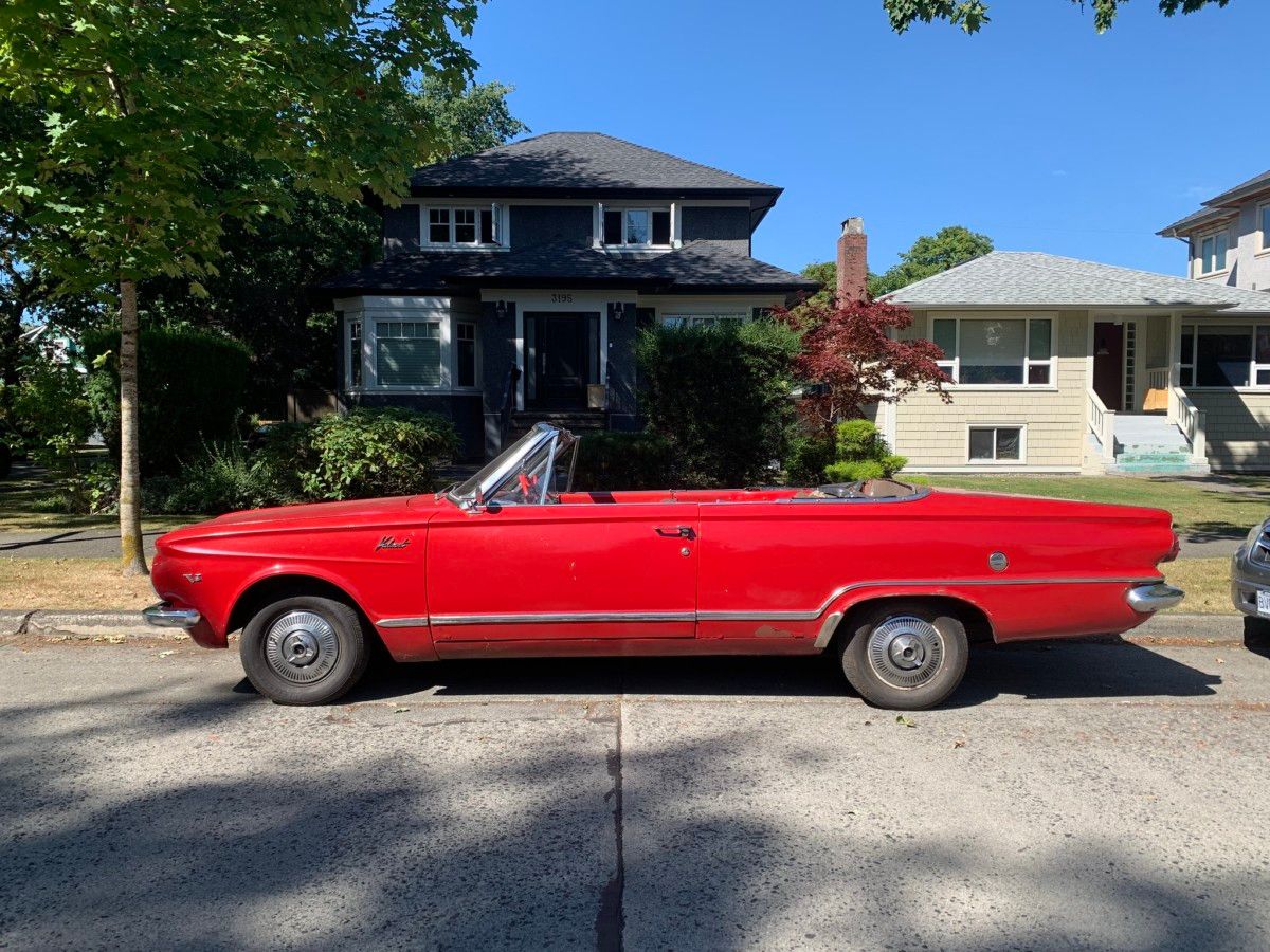 Cohort Pic(k) Of The Day: 1964 Valiant Convertible – Engelized Sun Chaser Here’s a new entry from robadr at the Cohort. A rather nice survivor that doesn’t look too pampered, nor too ruined; and with the top down, it’s very curbside chic!
