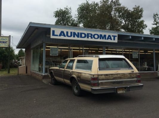 CC Outtake: Buick Estate Wagon at Mary Lou’s Laundromat I’ve seen this Estate Wagon slowly fading away over the years, and often in this spot in front of Mary Lou’s Laundromat? Is it Mary Lou’s?
