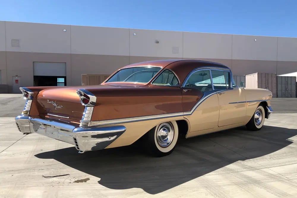 Automotive History: 1949–1970 Oldsmobile Holiday Hardtop – A Holiday In Lansing (With Apologies To Irving Berlin) 12 Rear 3q of a Shantung Bronze and Cutlass Beige two-tone 1957 Oldsmobile 98 four-door hardtop