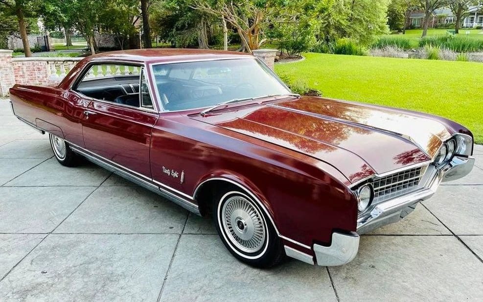 Automotive History: 1949–1970 Oldsmobile Holiday Hardtop – A Holiday In Lansing (With Apologies To Irving Berlin) 32 Front 3q view of a Burgundy Mist 1966 Oldsmobile 98 two-door hardtop