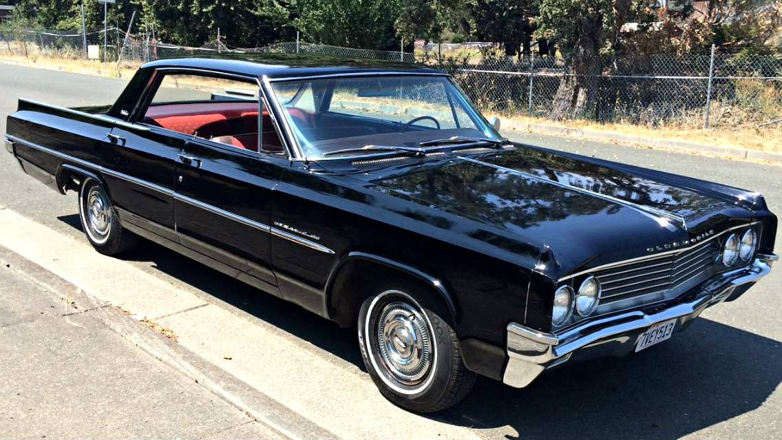 Automotive History: 1949–1970 Oldsmobile Holiday Hardtop – A Holiday In Lansing (With Apologies To Irving Berlin) 26 Front 3q of a black 1963 Oldsmobile Dynamic 88 four-door sedan