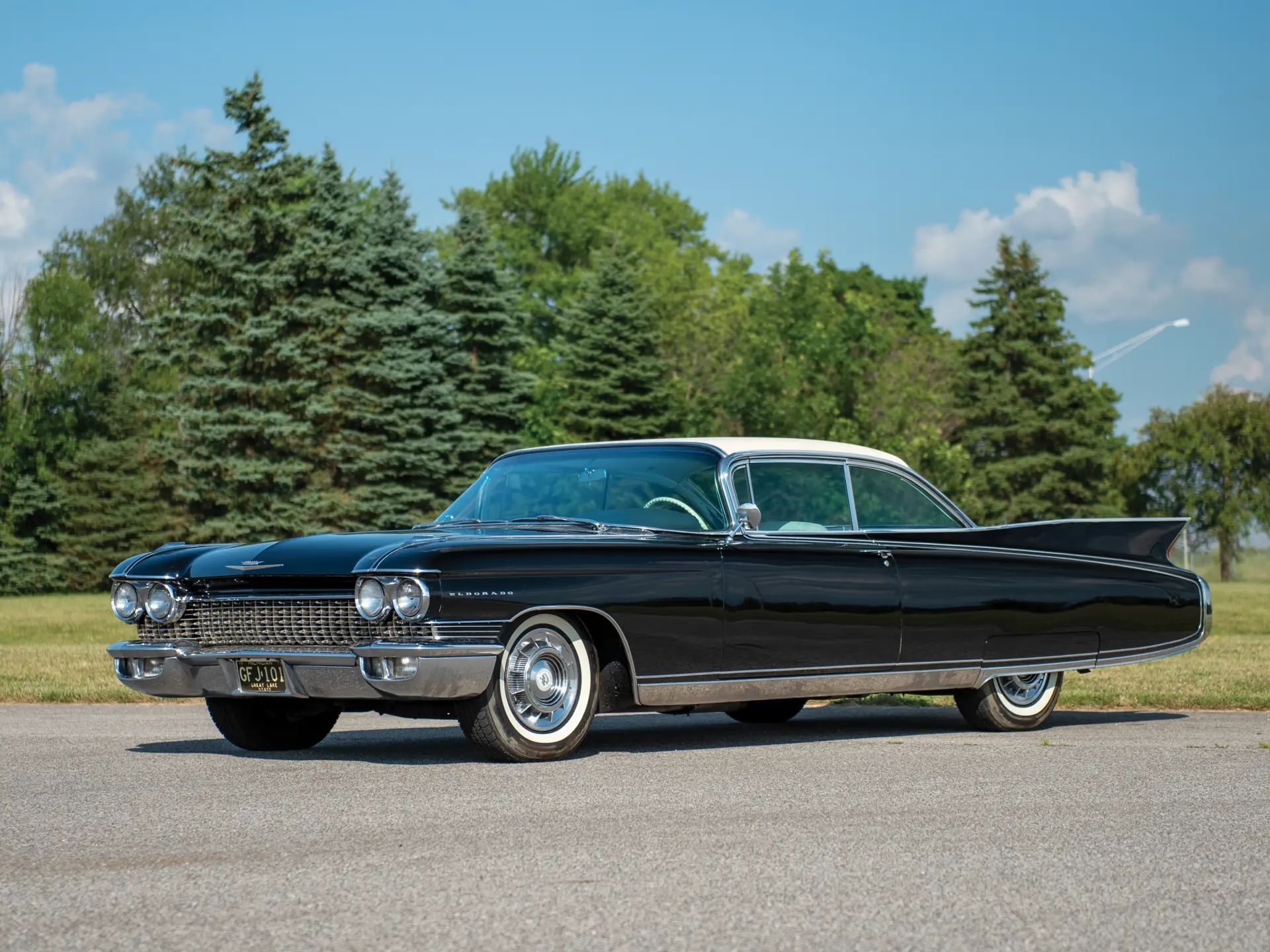 1960 Cadillac Eldorado Seville: An Artifact Of The Tomorrow That Never Was 14 Front 3q view of a black 1960 Cadillac Eldorado Seville with a white vinyl roof