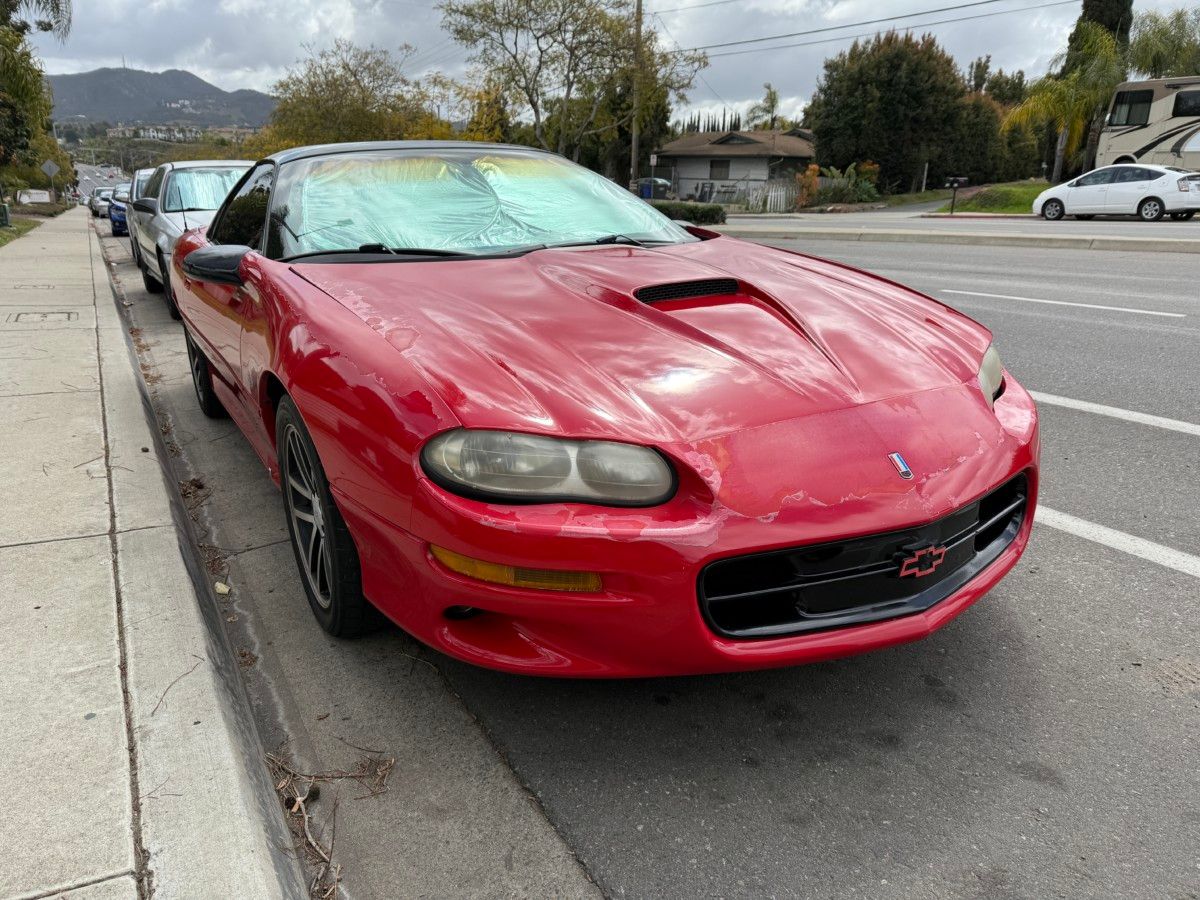 &nbsp; On one of my drives through the town where I had found a gray import Land Rover Defender, I noticed another curbside gem. A facelifted fourth-generation Camaro with a [&hellip;]