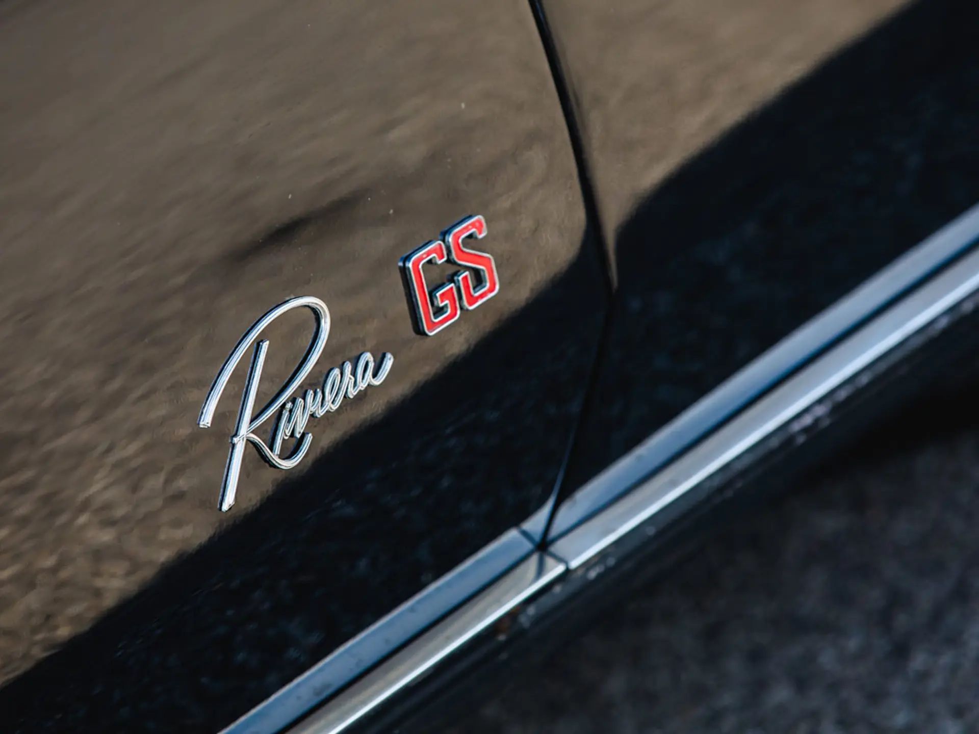 1966 Buick Riviera Versus 1966 Oldsmobile Toronado – Closely Related, Yet So Different (Part 1) 29 Riviera GS badge on the fender of a Regal Black 1966 Buick Riviera Gran Sport