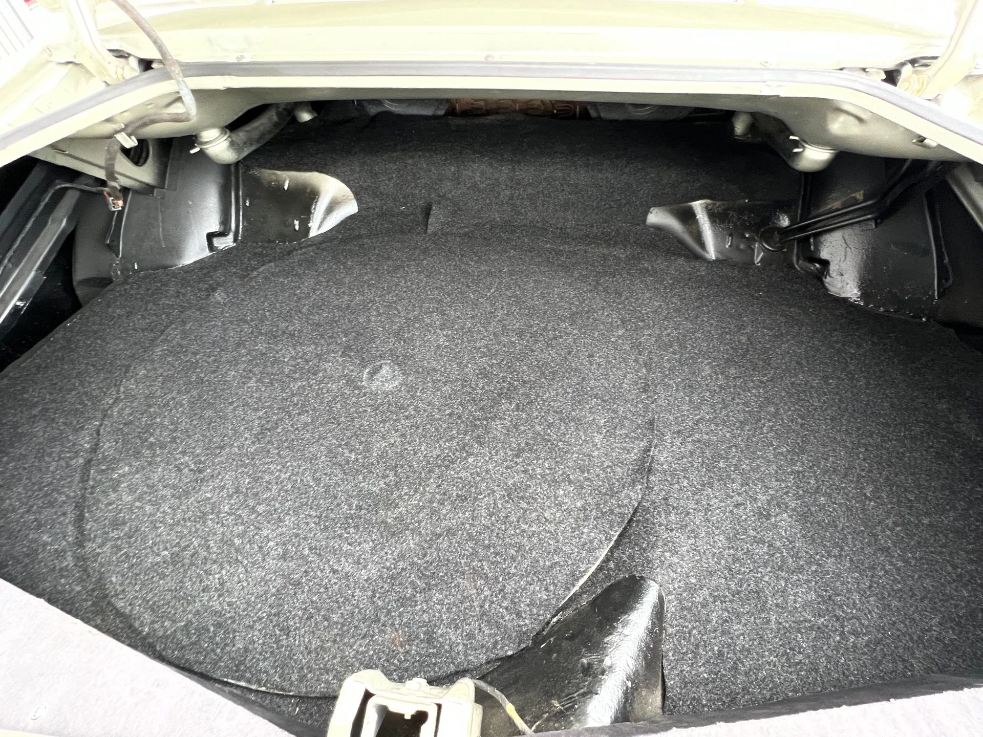 1966 Buick Riviera Versus 1966 Oldsmobile Toronado – Closely Related, Yet So Different (Part 2) 22 Trunk compartment of a Silver Green 1966 Buick Riviera