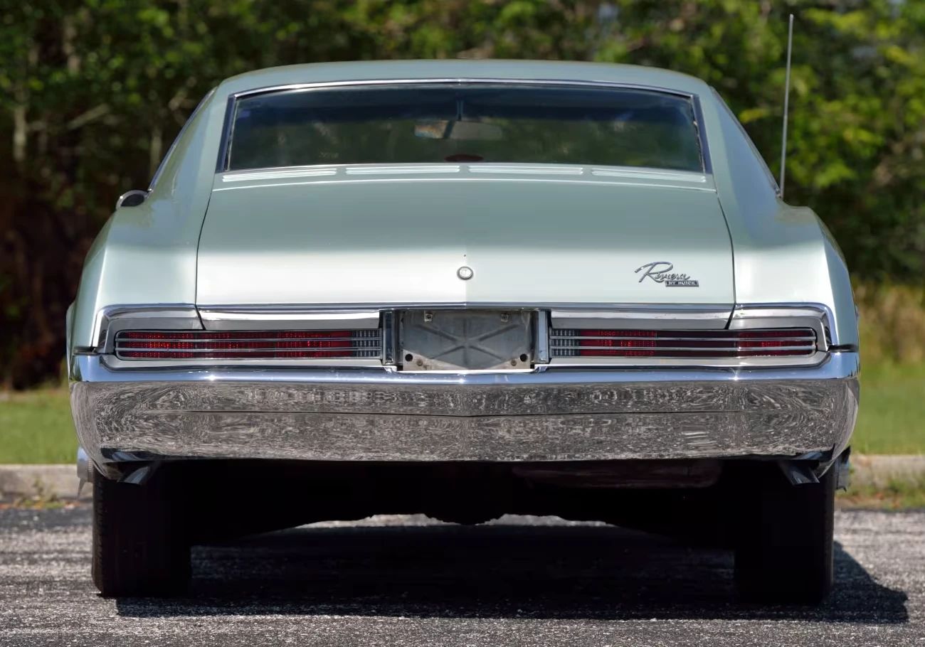 1966 Buick Riviera Versus 1966 Oldsmobile Toronado – Closely Related, Yet So Different (Part 1) 15 Rear view of a Silver Green 1966 Buick Riviera