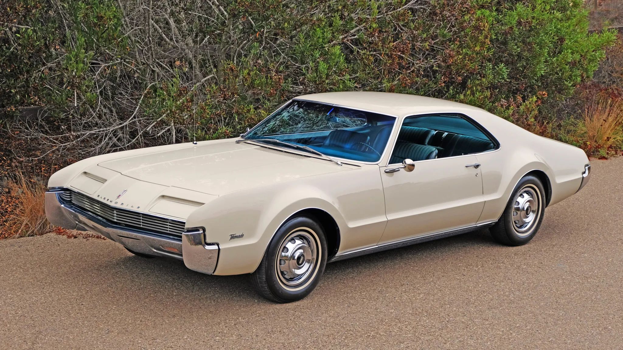 1966 Buick Riviera Versus 1966 Oldsmobile Toronado – Closely Related, Yet So Different (Part 2) 30 Left front 3q view of an Almond Beige 1966 Oldsmobile Toronado Deluxe