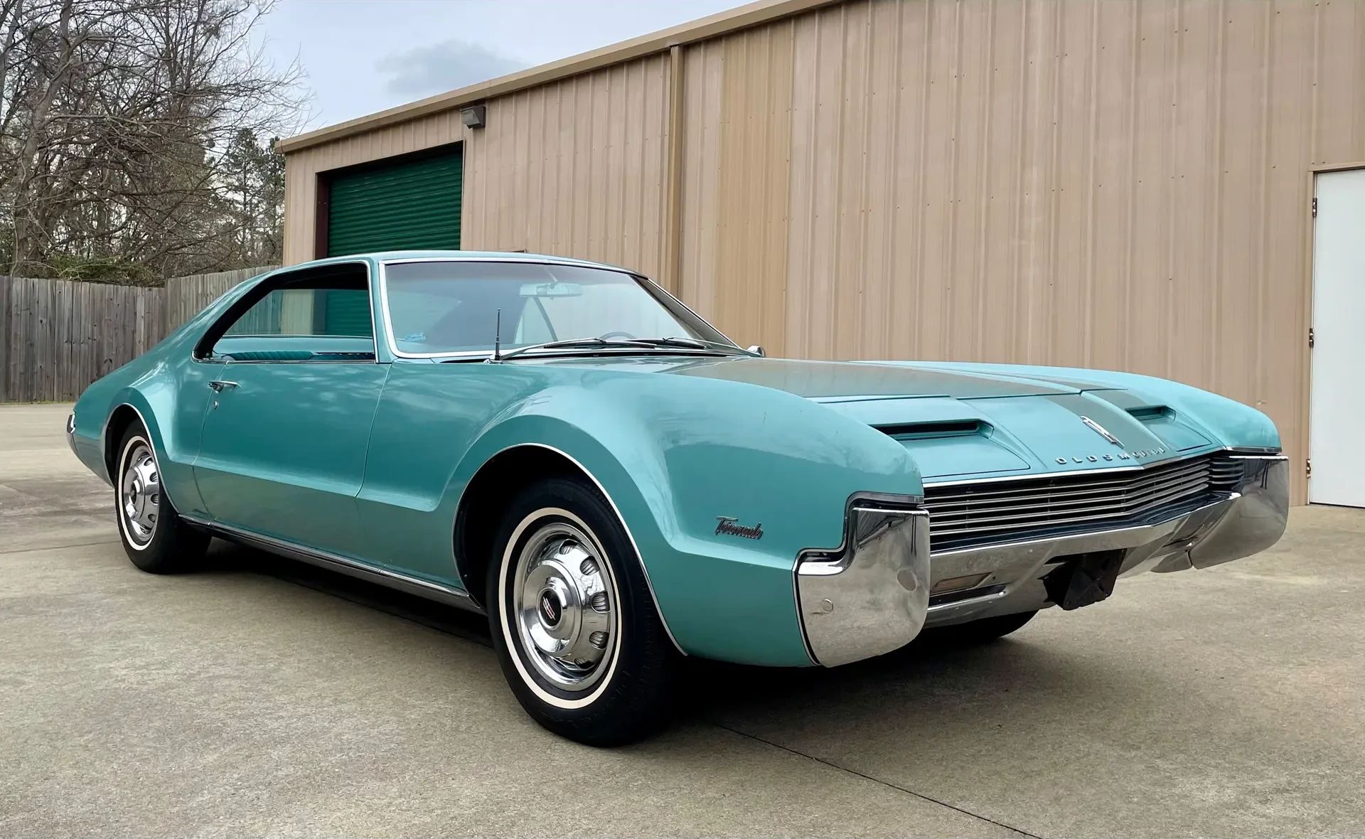 1966 Buick Riviera Versus 1966 Oldsmobile Toronado – Closely Related, Yet So Different (Part 1) 4 Right front view of an Ocean Mist 1966 Oldsmobile Toronado Deluxe