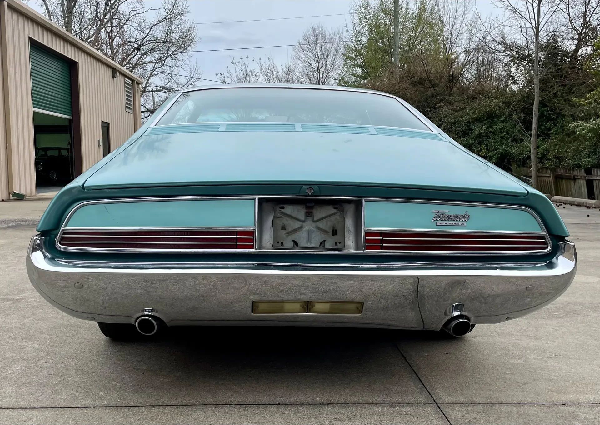 1966 Buick Riviera Versus 1966 Oldsmobile Toronado – Closely Related, Yet So Different (Part 1) 14 Rear view of an Ocean Mist 1966 Oldsmobile Toronado Deluxe