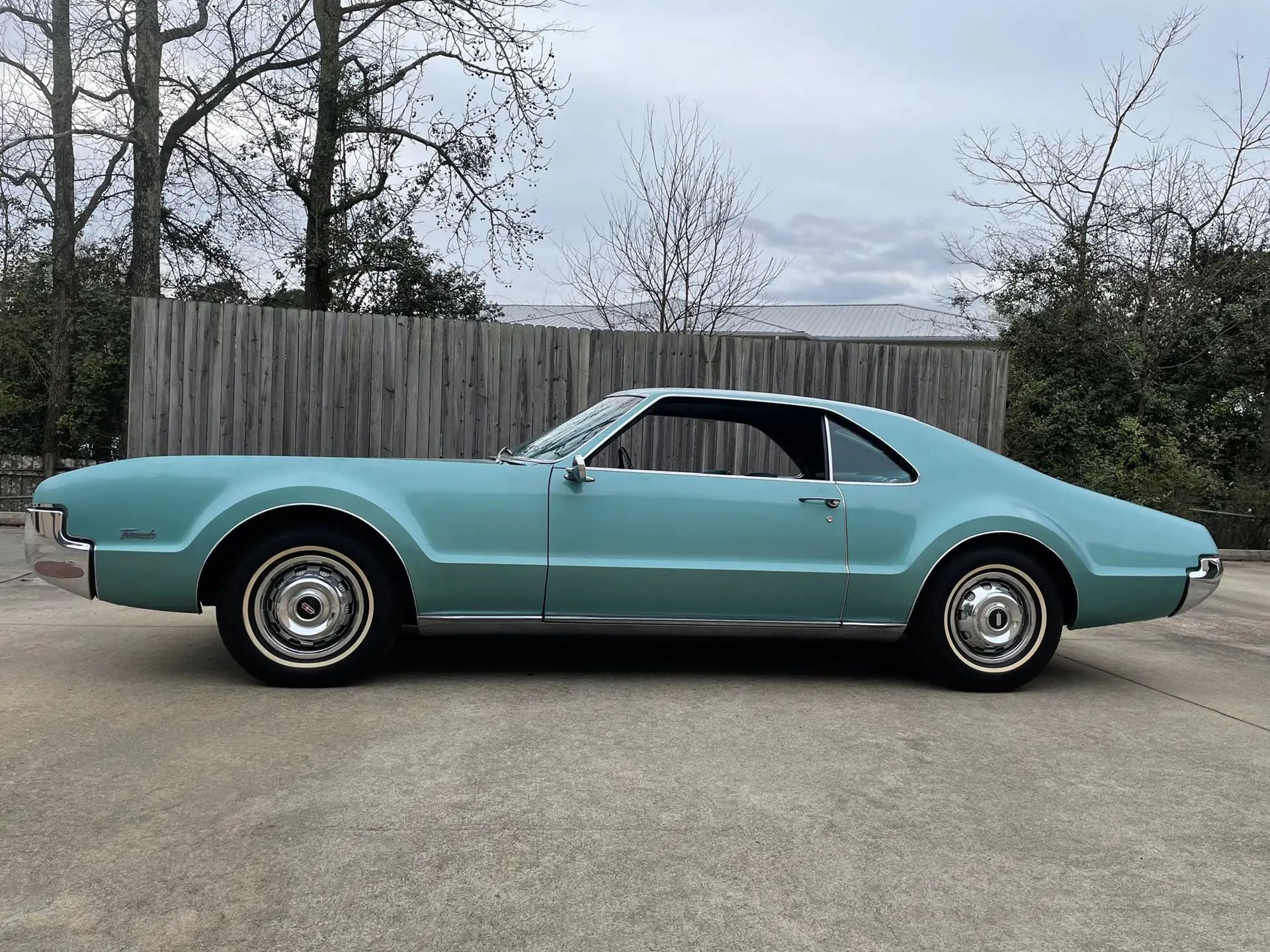 1966 Buick Riviera Versus 1966 Oldsmobile Toronado – Closely Related, Yet So Different (Part 1) 33 Left side view of an Ocean Mist 1966 Oldsmobile Toronado Deluxe