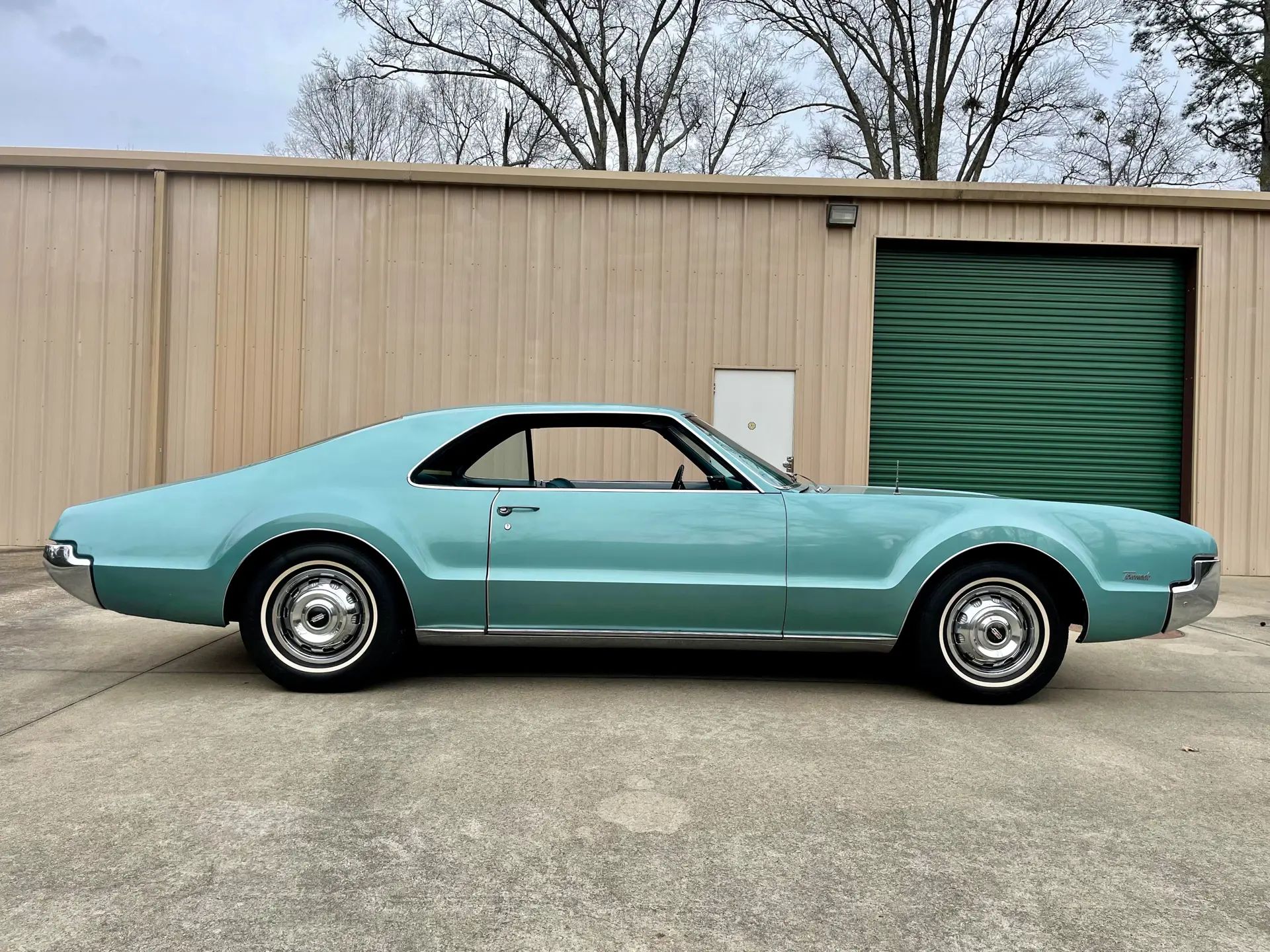 1966 Buick Riviera Versus 1966 Oldsmobile Toronado – Closely Related, Yet So Different (Part 1) 6 Right side view of an Ocean Mist 1966 Oldsmobile Toronado Deluxe