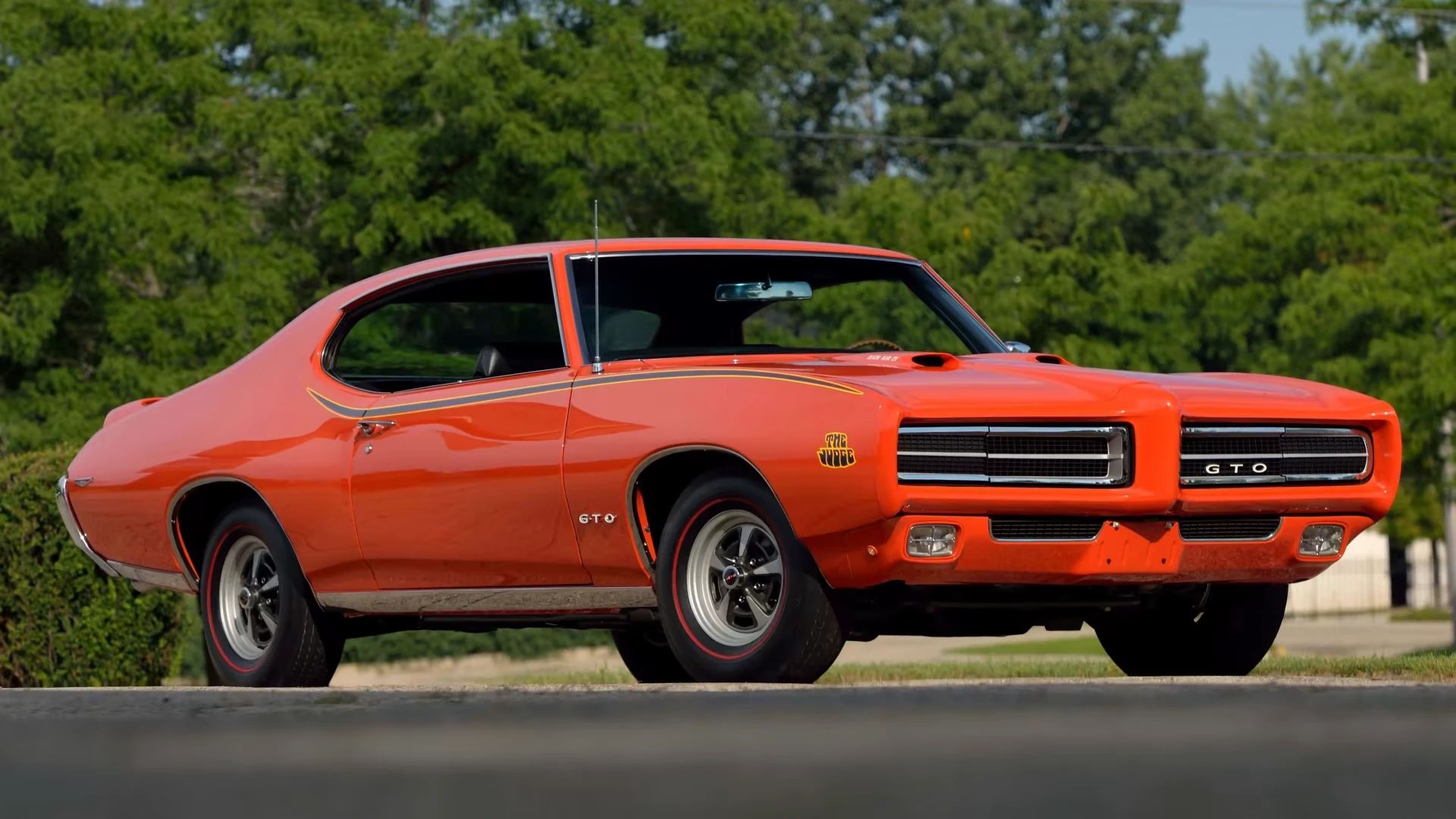 Dressed in bright orange (“Carousel Red”) and festooned with decals; offering flashy looks, high performance, and a lengthy list of gimmicks; and bearing a name inspired by a popular TV [&hellip;]